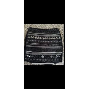 H&M sexy flirty, lightweight black mini with sequins and beads has a slip lining